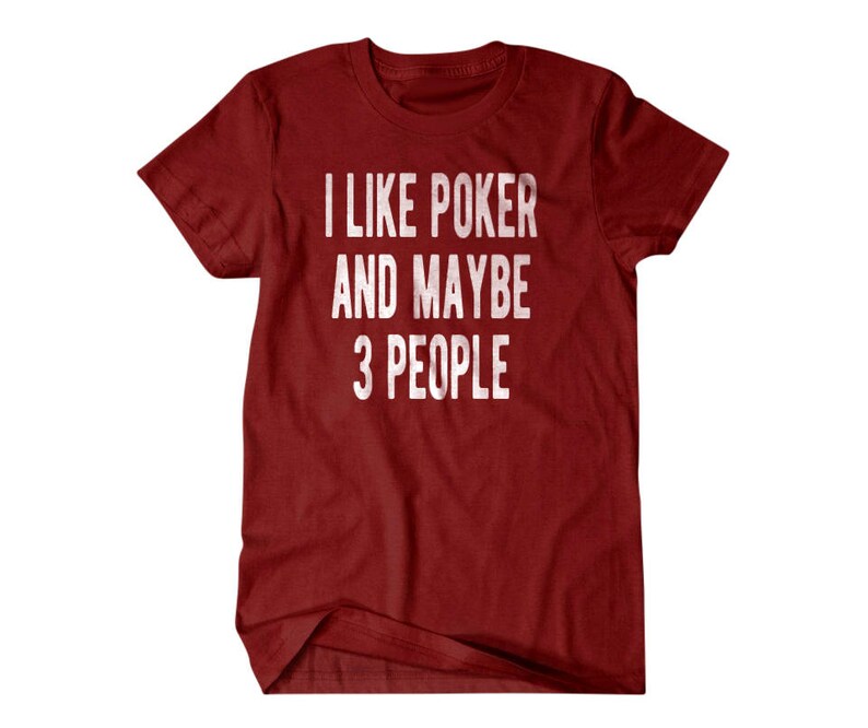 May include: Red t-shirt with white text that reads "I like poker and maybe 3 people".
