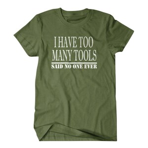 May include: Green t-shirt with white text that reads "I have too many tools said no one ever".