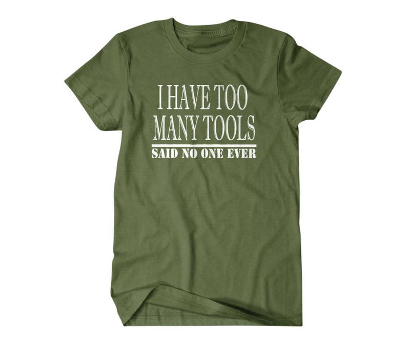May include: Green t-shirt with white text that reads "I have too many tools said no one ever".