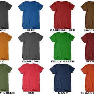 May include: A collage of 12 t-shirts in various colors, including black, blue, cardinal red, chocolate, gold, charcoal, kelly green, maroon, military green, red, navy, and texas orange.
