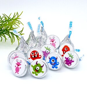 A set of colorful monster party favor labels for kids birthday treat bags and candy buffets.