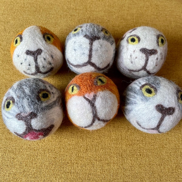 Wool dryer balls with hand felted designs. Cute, eco- friendly and useful