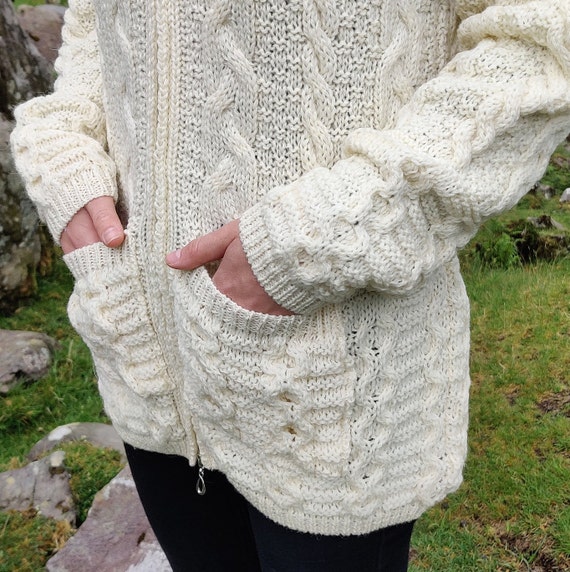 KateIrishTweedStore Irish Aran Long Hooded Cardigan with Pockets - Cream - 100% Pure New Wool - Really Warm & Chunky - Proper Aran - Made in Ireland KateIrishTweedStore Irish Aran Long Hooded Cardigan with Pockets - Cream - 100% Pure New Wool - Really Warm & Chunky - Proper Aran - Made in Ireland