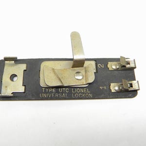 Lionel Prewar UTC Universal Lockon    Fits Both Standard Gauge and O Gauge Tubular Track  and Solid T Rail Track