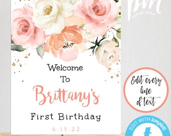 May include: A white sign on an easel with floral accents and the text "Welcome To Brittany's First Birthday 6.15.22". The sign is 16 x 20 inches and features a watercolor floral design in pink, peach, and white.