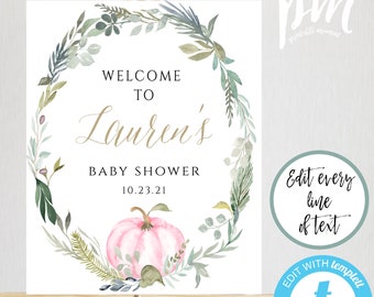 May include: A printable welcome sign for a baby shower featuring a watercolour wreath of greenery and a pink pumpkin. The sign reads "Welcome to Lauren's Baby Shower 10.23.21". The sign measures 40.6 cm by 50.8 cm.