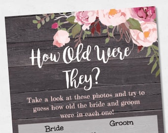 May include: A printable game card with a rustic wood background and pink floral accents. The card has the text "How Old Were They?" and asks players to guess the ages of the bride and groom in photos. The card has a list of numbers 1-7 for the bride and 8-14 for the groom.