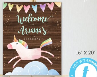 May include: A printable welcome sign for a 7th birthday party featuring a pink unicorn with a rainbow mane and tail, flying over clouds against a brown woodgrain background. The sign says "Welcome to Ariana's 7th Birthday".