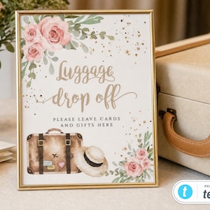 Peut inclure: Un panneau encadré d'or avec le texte Luggage drop off et Please leave cards and gifts here. Le design présente des illustrations à l'aquarelle de roses roses, de feuillage vert, de taches dorées, d'une valise vintage brune et d'un chapeau de paille.