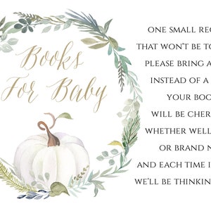 May include: A white pumpkin with green leaves around it. The text "Books for Baby" is written in gold script. The text "One small request, that won't be too hard. Please bring a book, instead of a card. Your book will be cherished, whether well loved or brand new, and each time it's read, we'll be thinking of you!" is written in black.