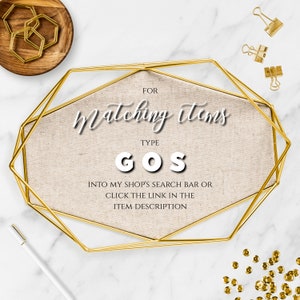 May include: A gold-toned geometric frame with a beige fabric background. The text "FOR Matching Items TYPE GOS INTO MY SHOP'S SEARCH BAR OR CLICK THE LINK IN THE ITEM DESCRIPTION" is printed on the fabric.