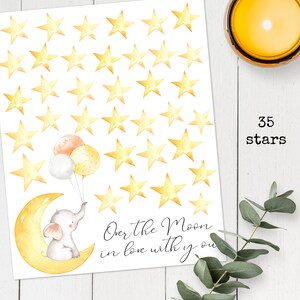May include: A printable baby shower game featuring a cute gray elephant holding balloons and sitting on a yellow crescent moon. The background is filled with 35 yellow stars. The text "Over the Moon in love with you" is written below the elephant.