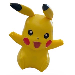 May include: A set of three ceramic mugs with a speckled, matte finish. The mugs are in shades of cream, light gray, and dark gray. Each mug has a simple, minimalist design and a rounded handle. The mugs are likely for coffee or tea.