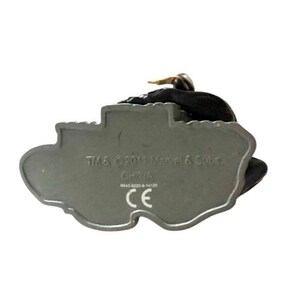 May include: A gray plastic figurine of a character from the Marvel universe. The bottom of the figurine has the text "TM & &copy; 2011 Marvel & Subs. CHINA  CE".