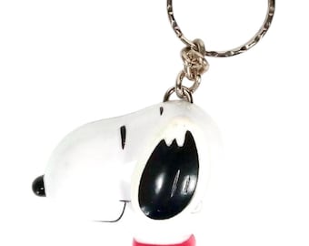 Portachiavi vintage in plastica con orologio di Snoopy dei Peanuts per il 50° anniversario (non funzionante)