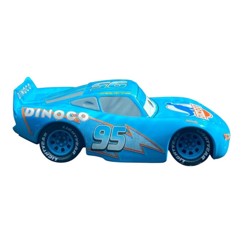 May include: A light blue toy race car with the number 95 on the side and the word "Dinoco" printed on the side and top. The car has black tires with the word "Lightyear" printed on the tires.