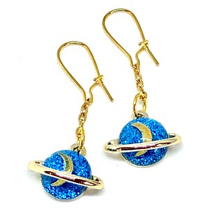 Blue Sparkle Glitter Glass Dome Saturn Ringed Planet with Crescent Moon Gold Tone Chain Dangle Earrings 1.5” Long 15mm W Celestial Jewelry