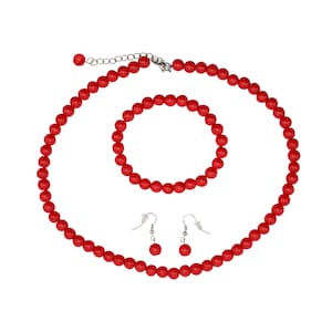 May include: A red bead necklace, bracelet and earrings set. The necklace and bracelet are made of round red beads. The earrings are simple red bead drop earrings.