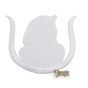 May include: White embroidered iron-on patch of an Egyptian pharaoh with a cobra on the head and a uraeus on the back. The patch is approximately 3 inches wide and 3 inches tall.
