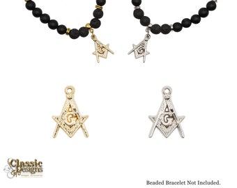 May include: Two gold and silver Masonic square and compass charms. The charms are on a black beaded bracelet. Beaded bracelet not included.