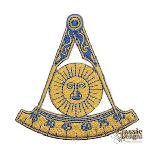 May include: A gold and blue embroidered patch featuring a compass and square with a sun in the center. The sun has a face and rays. The compass and square are decorated with ornate designs. The patch has numbers from 15 to 90 around the bottom edge.