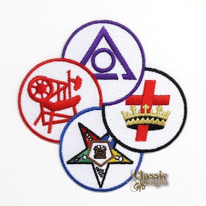 May include: Five embroidered patches in a circle, each with a different symbol. The top patch is purple and white with a triangle and circle. The patch to the right is white with a red cross and a gold crown. The patch to the left is white with a red symbol of a wheel and a ladder. The bottom patch is white with a blue five-pointed star and a brown symbol. The patch to the right of the bottom patch is white with a black five-pointed star.