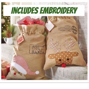 May include: Two burlap Christmas gift bags with embroidered designs. One bag features a Santa Claus face and the text "Approved by Santa". The other bag features a reindeer face with red polka dots. The text "Includes Embroidery" is displayed at the top of the image.