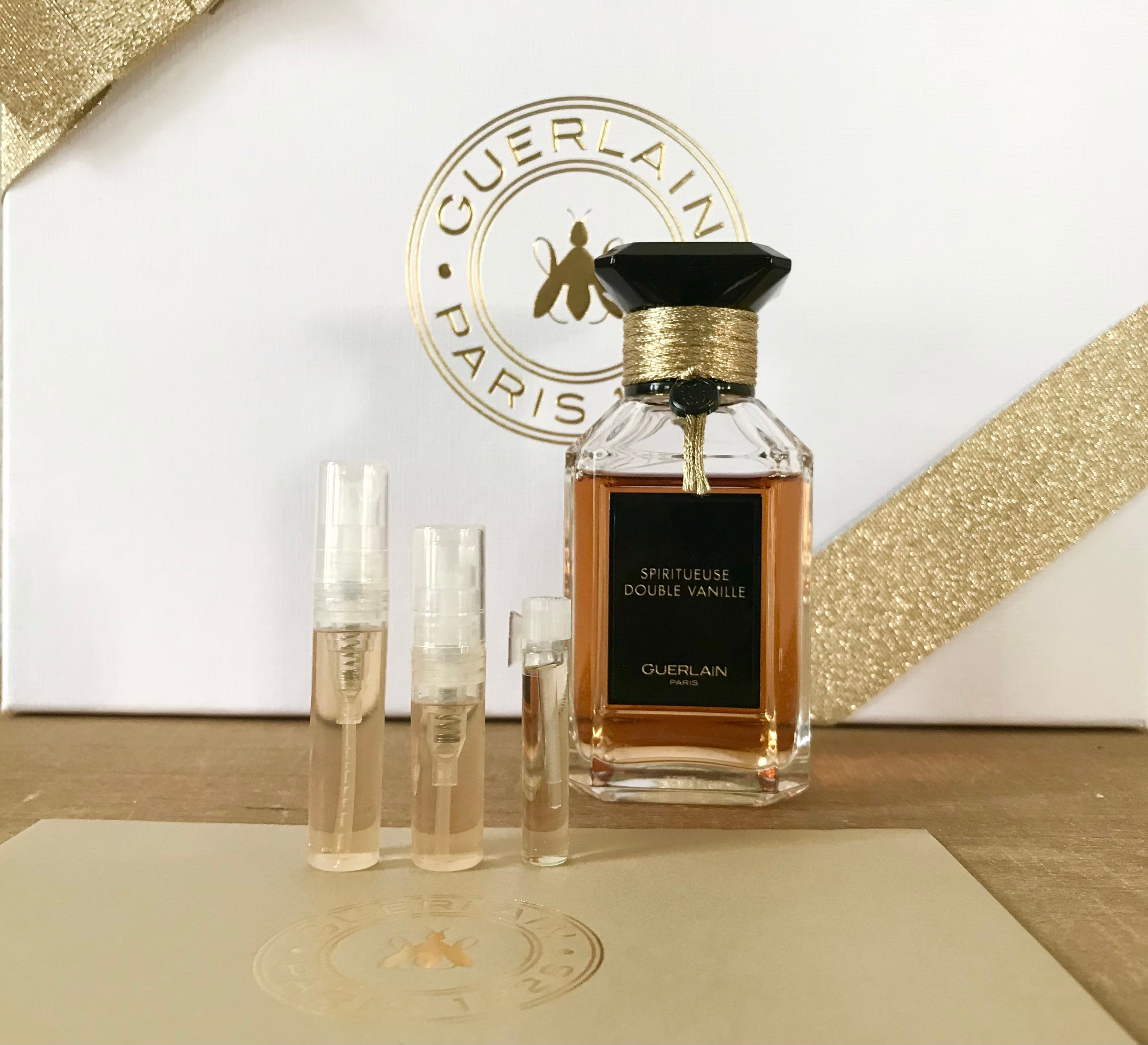 Духи герлен отзывы. Guerlain 099. Spiritueuse Double Vanille Рени. Spiritueuse Double Vanille Guerlain купить духи.