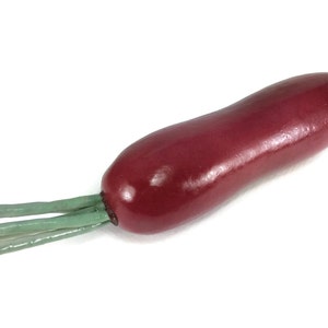 May include: A red radish with green leafy stems. The radish is long and slender, with a smooth, glossy surface.