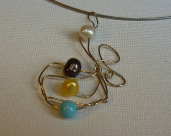 Fancy pendant with freshwater pearls