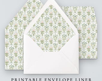 May include: White envelope with a floral patterned liner. The liner features a repeating design of green, blue, and pink flowers on a white background. The text "PRINTABLE ENVELOPE LINER" and "• 10 SIZES INCLUDED •" are printed below the envelopes.