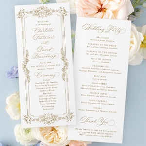 May include: Two wedding programs with gold calligraphy and floral details. The left program details the wedding, including the couple's names, date, and location. The right program lists the wedding party. Soft-toned flowers surround the programs.