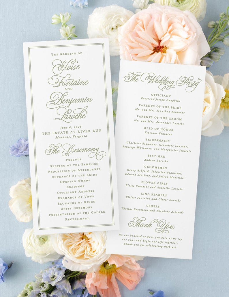 a wedding invitation card with elegant text and floral decorations.