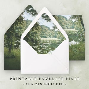 May include: Printable envelope liner with a green and blue landscape design featuring a lake with lily pads and trees. The text "Printable Envelope Liner" and "10 Sizes Included" is printed below the image.
