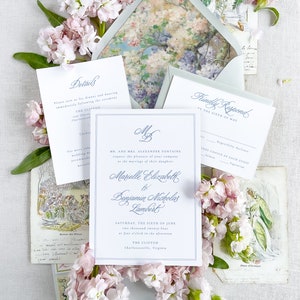 May include: A wedding invitation with a floral design. The invitation is for Marielle Elizabeth and Benjamin Nicholas Lambert. The wedding will take place on Saturday, June 6th, 2024 at 4:00 PM at The Clifton in Charlottesville, Virginia.