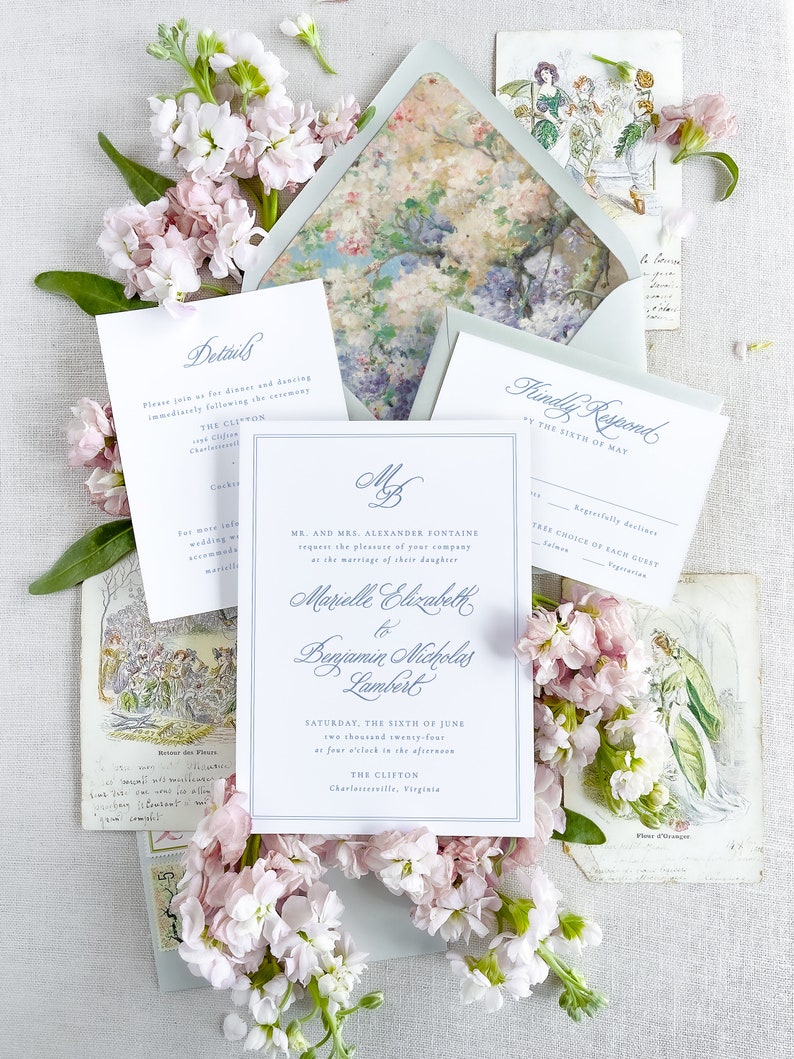 May include: A wedding invitation with a floral design. The invitation is for Marielle Elizabeth and Benjamin Nicholas Lambert. The wedding will take place on Saturday, June 6th, 2024 at 4:00 PM at The Clifton in Charlottesville, Virginia.