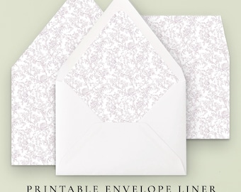 May include: Printable envelope liner with a delicate floral pattern in shades of white and light purple. The text "Printable Envelope Liner" and "10 Sizes Included" is displayed below the image.