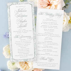 May include: Wedding stationery with the names Julienne Fontaine and Myden Laroche, dated June 6, 2028. The ceremony details and wedding party are listed on separate cards, surrounded by pastel flowers. The design is classic and romantic, suitable for a wedding.
