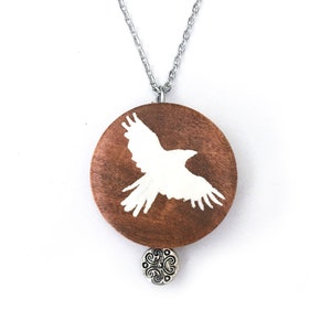 White raven painted wood pendant necklace image 1