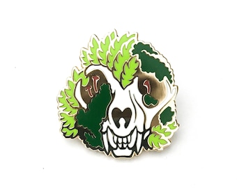 Bone Garden bobcat skull hard enamel pin