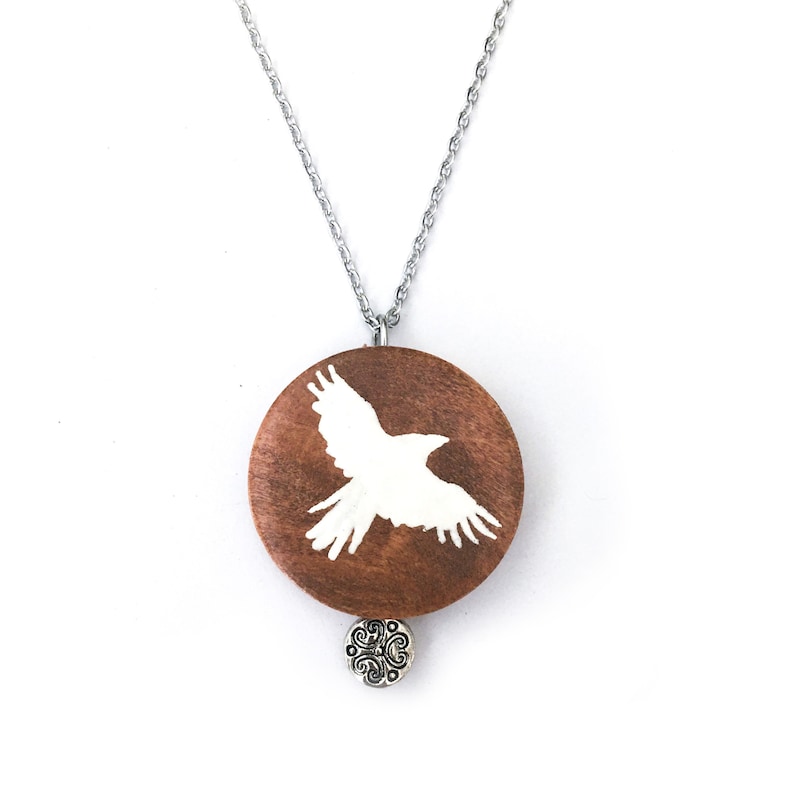 White raven painted wood pendant necklace image 1