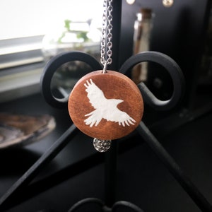 White raven painted wood pendant necklace image 2