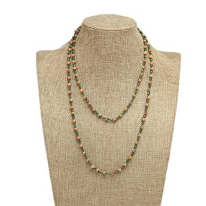 46&quot; Long Single Strand Juniper Berry Seed Necklace Clear Glass Green Color
