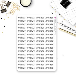 May include: A sheet of white planner stickers with the word "APPOINTMENT" repeated 16 times in black text. The stickers are designed for use in a planner or journal.