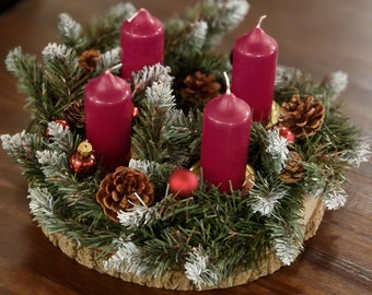 Advent arrangement on wood Advent wreath on tree slice Christmas decoration