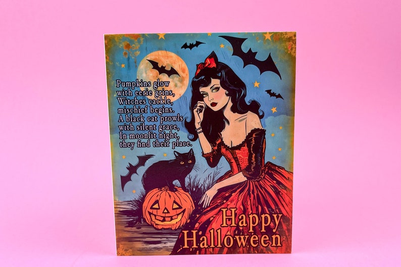 May include: Vintage-style Halloween art print featuring a woman in a red dress, a black cat, and a jack-o'-lantern. The artwork includes bats, a full moon, and the words "Happy Halloween" and a poem.