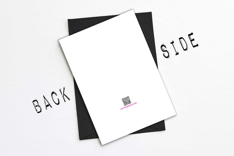 May include: A white card with a black envelope, labeled "BACK" and "SIDE" in a handwritten font. A QR code and website address are printed on the card. The card is angled on a white surface.