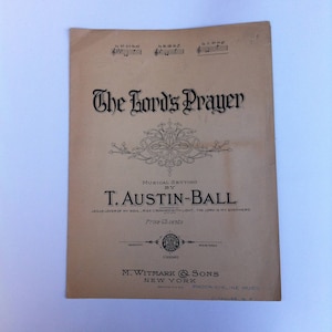 Puede incluir: Una portada de partitura musical vintage para "La Oración del Señor" con una puesta en música de T. Austin-Ball. La portada presenta un diseño floral decorativo y el texto "Jesús, amante de mi alma, levántate coronado de luz - El Señor es mi pastor". El precio se indica en 65 centavos.