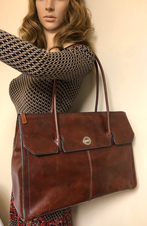 Wilson’s Italian leather Pelle Studio Wine Burgund
