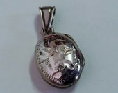 Tiny Vintage Locket Sterling Silver, Puffy Egg Shape, Signed Burkhardt Canada